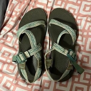 Grey chaco’s with white and green straps